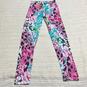 Ladies colorful athletic leggings in size small by Grata Designs